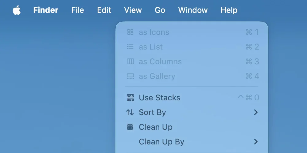 The Finder View menu, with the symbols for Control, Command and 0 shown to the right of Use Stacks