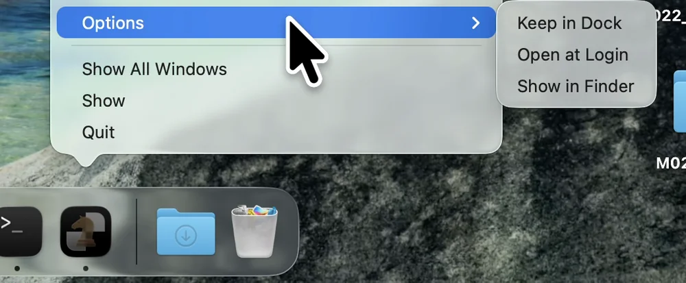 The menu for an app icon in the Dock with Options open, showing Keep in Dock, Open at Login and Show in Finder