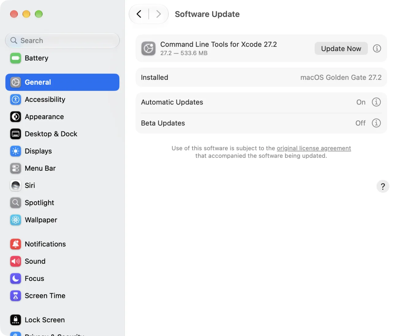 The Software Update pane of System Settings. The Installed line reads macOS Golden Gate 27.2. Below it, Automatic Updates is On and Beta Updates is Off. At the top, an update for Command Line Tools for Xcode 27.2 is offered with an Update Now button